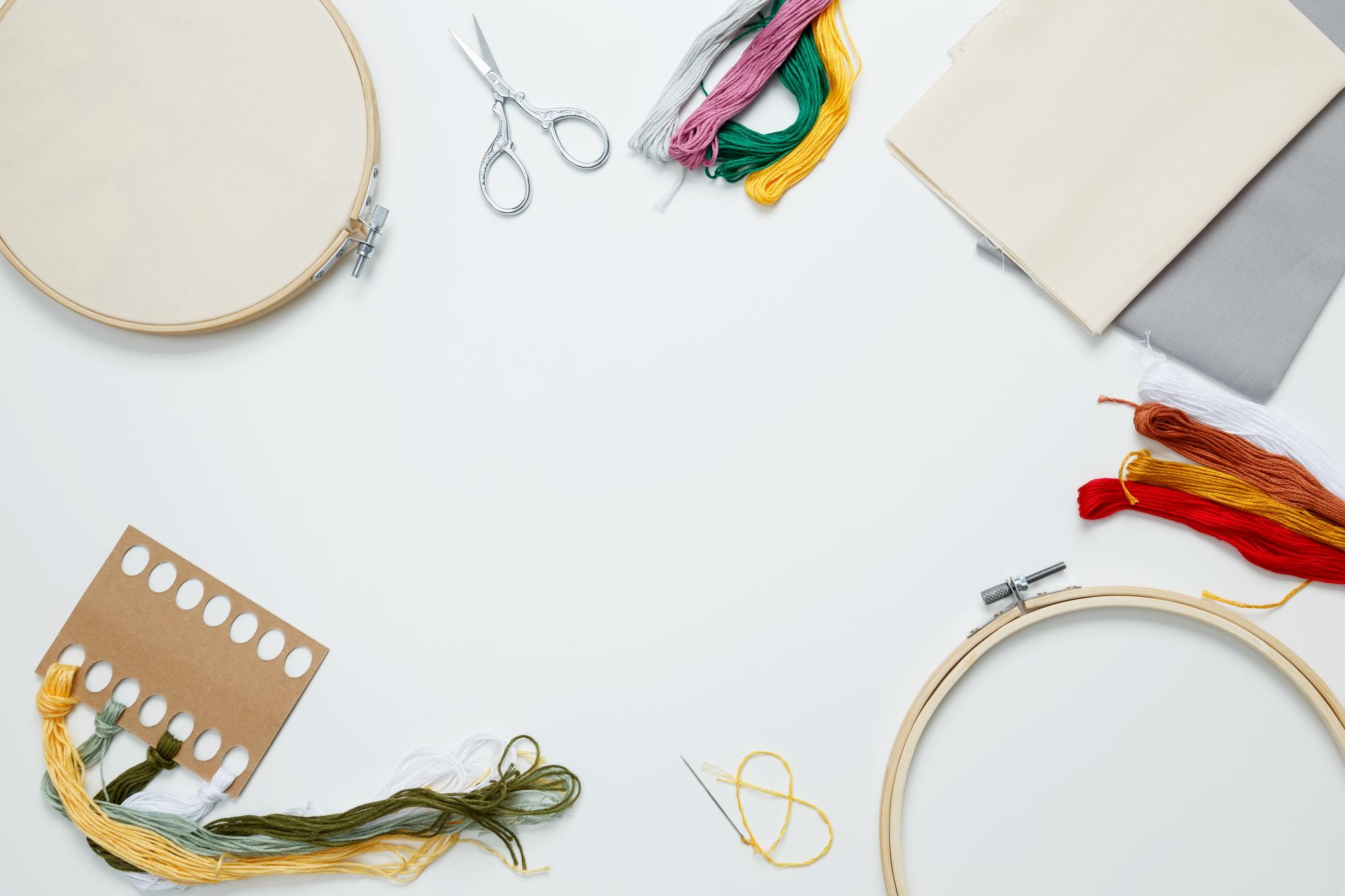 Studio table with threads and hoop