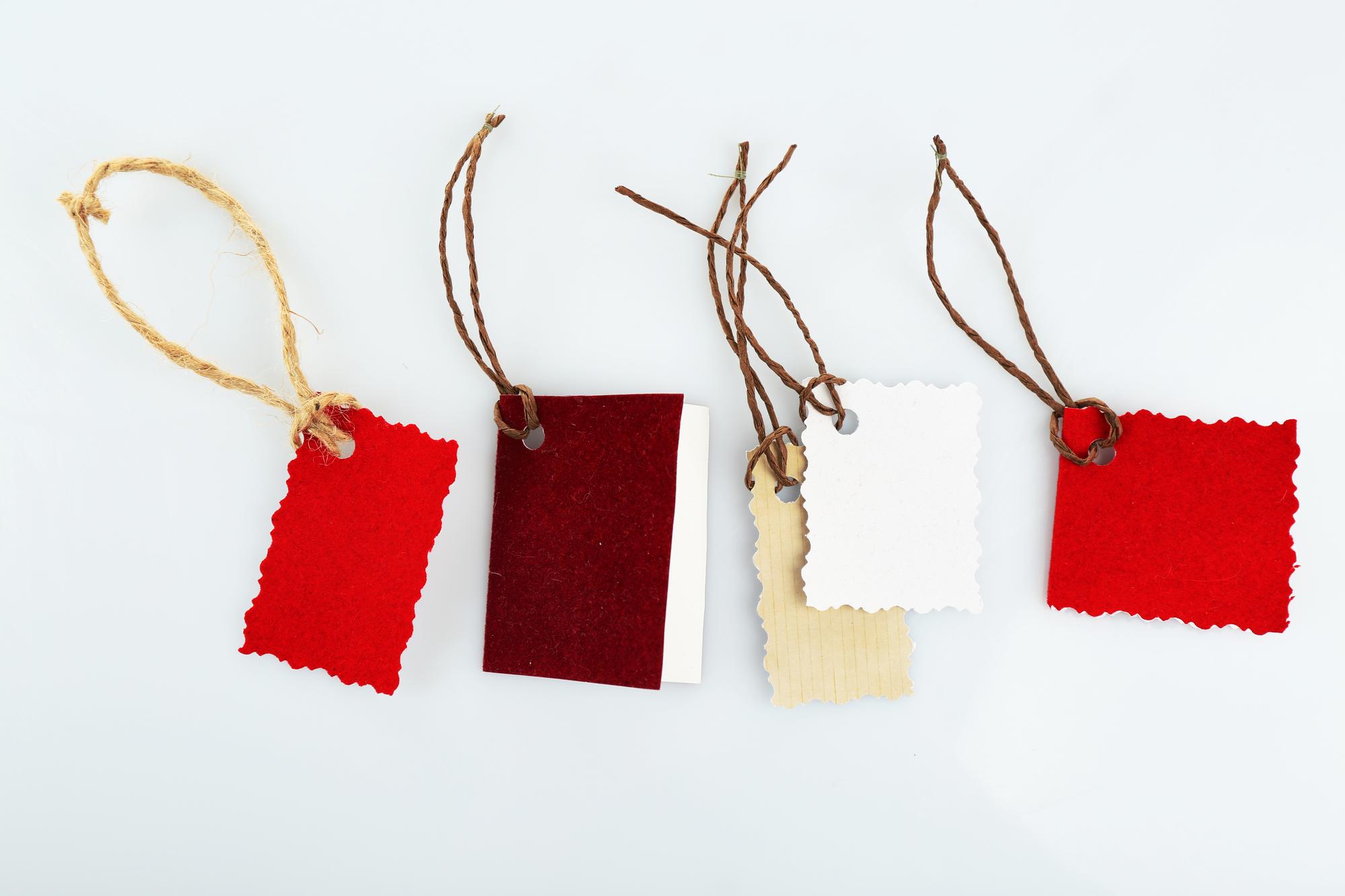 Flatlay of embroidered samples and price tags
